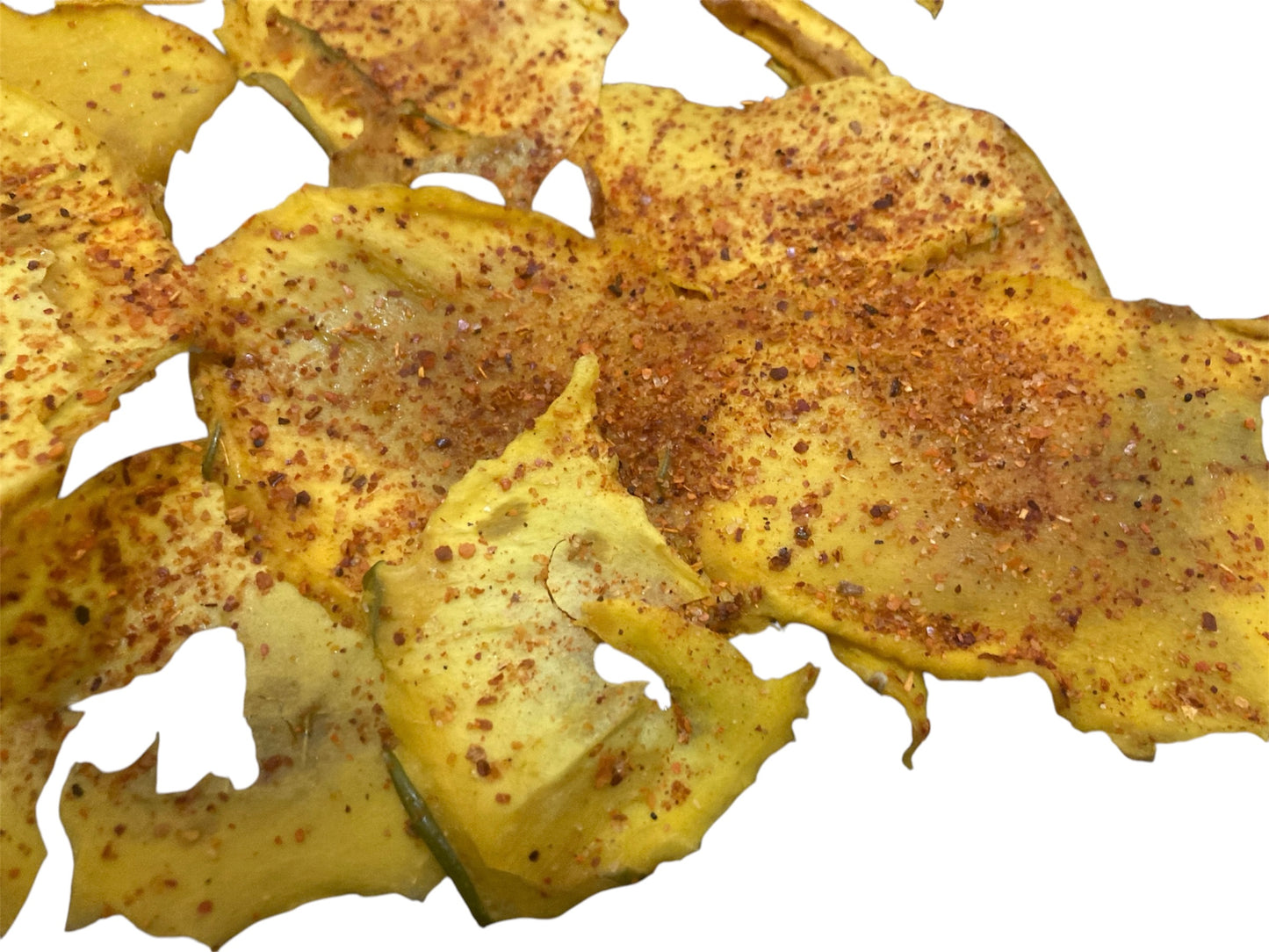 Rebanadas de mango espolvoreadas con Tajín